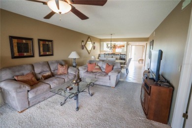 Top-Floor Condo with Golf Course Views, Elevator Access on Tarpon Springs Golf Course in Florida - for sale on GolfHomes.com, golf home, golf lot