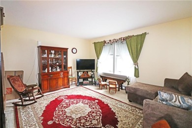 Colonial styled home with 3 beds & 3 baths including a water on Montaup Country Club in Rhode Island - for sale on GolfHomes.com, golf home, golf lot