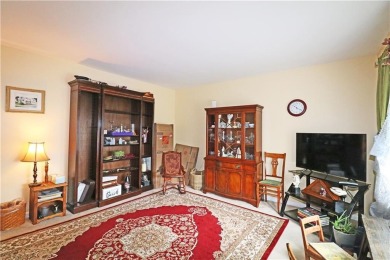 Colonial styled home with 3 beds & 3 baths including a water on Montaup Country Club in Rhode Island - for sale on GolfHomes.com, golf home, golf lot