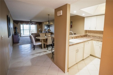 Top-Floor Condo with Golf Course Views, Elevator Access on Tarpon Springs Golf Course in Florida - for sale on GolfHomes.com, golf home, golf lot