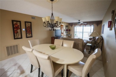 Top-Floor Condo with Golf Course Views, Elevator Access on Tarpon Springs Golf Course in Florida - for sale on GolfHomes.com, golf home, golf lot