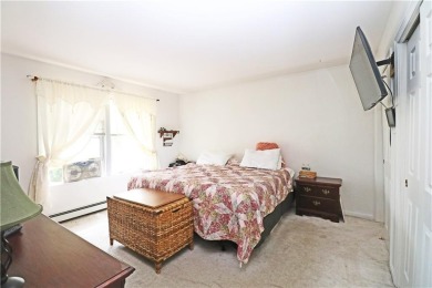 Colonial styled home with 3 beds & 3 baths including a water on Montaup Country Club in Rhode Island - for sale on GolfHomes.com, golf home, golf lot