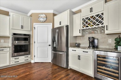 This beautifully maintained home positioned behind the 13th tee on Crow Creek Golf Club in North Carolina - for sale on GolfHomes.com, golf home, golf lot