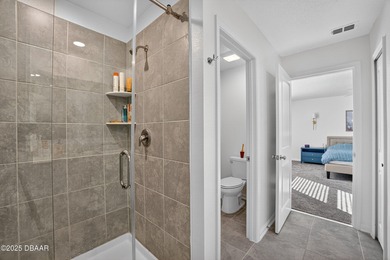 Welcome to this stunning 4-bedroom, 2.5-bath single-family home on LPGA International Golf Course in Florida - for sale on GolfHomes.com, golf home, golf lot