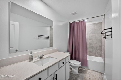 Welcome to this stunning 4-bedroom, 2.5-bath single-family home on LPGA International Golf Course in Florida - for sale on GolfHomes.com, golf home, golf lot