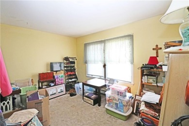 Colonial styled home with 3 beds & 3 baths including a water on Montaup Country Club in Rhode Island - for sale on GolfHomes.com, golf home, golf lot