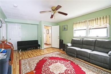 Colonial styled home with 3 beds & 3 baths including a water on Montaup Country Club in Rhode Island - for sale on GolfHomes.com, golf home, golf lot