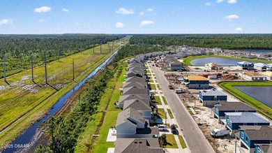 Welcome to this stunning 4-bedroom, 2.5-bath single-family home on LPGA International Golf Course in Florida - for sale on GolfHomes.com, golf home, golf lot