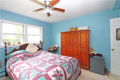 Colonial styled home with 3 beds & 3 baths including a water on Montaup Country Club in Rhode Island - for sale on GolfHomes.com, golf home, golf lot