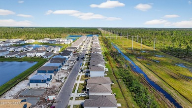 Welcome to this stunning 4-bedroom, 2.5-bath single-family home on LPGA International Golf Course in Florida - for sale on GolfHomes.com, golf home, golf lot