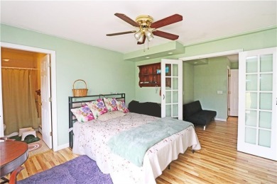 Colonial styled home with 3 beds & 3 baths including a water on Montaup Country Club in Rhode Island - for sale on GolfHomes.com, golf home, golf lot