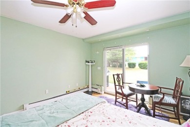 Colonial styled home with 3 beds & 3 baths including a water on Montaup Country Club in Rhode Island - for sale on GolfHomes.com, golf home, golf lot
