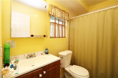 Colonial styled home with 3 beds & 3 baths including a water on Montaup Country Club in Rhode Island - for sale on GolfHomes.com, golf home, golf lot