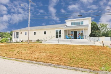 Colonial styled home with 3 beds & 3 baths including a water on Montaup Country Club in Rhode Island - for sale on GolfHomes.com, golf home, golf lot