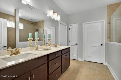 This beautifully maintained home positioned behind the 13th tee on Crow Creek Golf Club in North Carolina - for sale on GolfHomes.com, golf home, golf lot