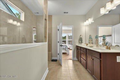 This beautifully maintained home positioned behind the 13th tee on Crow Creek Golf Club in North Carolina - for sale on GolfHomes.com, golf home, golf lot