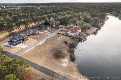 GOLF COURSE LOT AND LAKE VIEW IN PRESTIGIOUS GATES FOUR. Jack on Gates Four Golf and Country Club in North Carolina - for sale on GolfHomes.com, golf home, golf lot