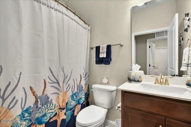 This beautifully maintained home positioned behind the 13th tee on Crow Creek Golf Club in North Carolina - for sale on GolfHomes.com, golf home, golf lot