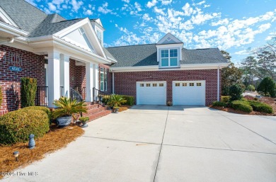 Gorgeous brick home on .54/acre with pond & golf views which is on Ocean Ridge Plantation in North Carolina - for sale on GolfHomes.com, golf home, golf lot