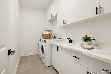 Stunning new construction home located on the golf course in a on Los Lagos Golf Club in Texas - for sale on GolfHomes.com, golf home, golf lot