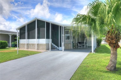 Well-maintained 2-bedroom, 2 bath home in the desirable Barefoot on Barefoot Bay Golf Course in Florida - for sale on GolfHomes.com, golf home, golf lot