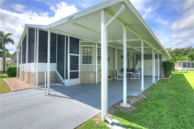 Well-maintained 2-bedroom, 2 bath home in the desirable Barefoot on Barefoot Bay Golf Course in Florida - for sale on GolfHomes.com, golf home, golf lot