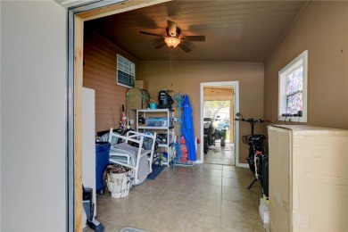 Well-maintained 2-bedroom, 2 bath home in the desirable Barefoot on Barefoot Bay Golf Course in Florida - for sale on GolfHomes.com, golf home, golf lot