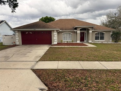 Beautifully maintained and updated 4 bed/2 bath home on a on Wedgefield Golf Club in Florida - for sale on GolfHomes.com, golf home, golf lot