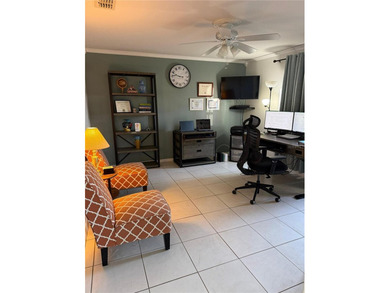 Beautifully maintained and updated 4 bed/2 bath home on a on Wedgefield Golf Club in Florida - for sale on GolfHomes.com, golf home, golf lot