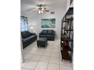 Beautifully maintained and updated 4 bed/2 bath home on a on Wedgefield Golf Club in Florida - for sale on GolfHomes.com, golf home, golf lot