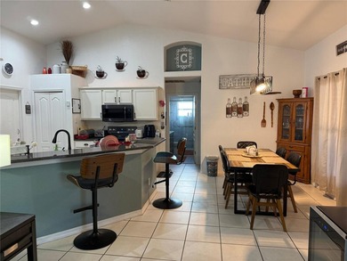 Beautifully maintained and updated 4 bed/2 bath home on a on Wedgefield Golf Club in Florida - for sale on GolfHomes.com, golf home, golf lot