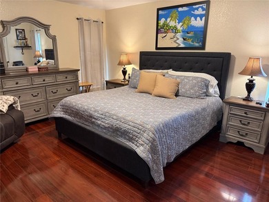 Beautifully maintained and updated 4 bed/2 bath home on a on Wedgefield Golf Club in Florida - for sale on GolfHomes.com, golf home, golf lot