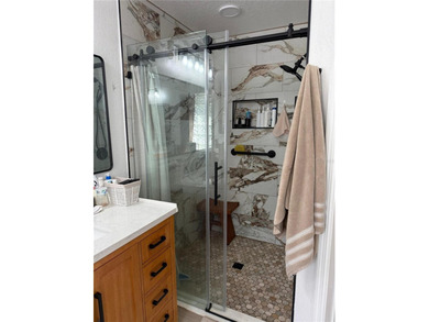 Beautifully maintained and updated 4 bed/2 bath home on a on Wedgefield Golf Club in Florida - for sale on GolfHomes.com, golf home, golf lot