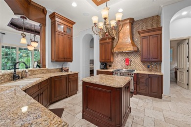 Luxury villa living within the exclusive Gardens of Isleworth on Isleworth Golf and Country Club in Florida - for sale on GolfHomes.com, golf home, golf lot