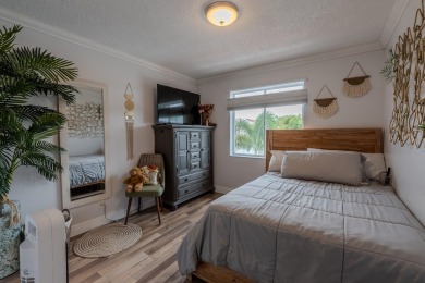 Step into elegance and comfort in this beautifully maintained on Atlantic National Golf and Country Club in Florida - for sale on GolfHomes.com, golf home, golf lot