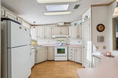 Enjoy relaxed Florida living in this beautifully updated on Plantation Golf Club in Florida - for sale on GolfHomes.com, golf home, golf lot