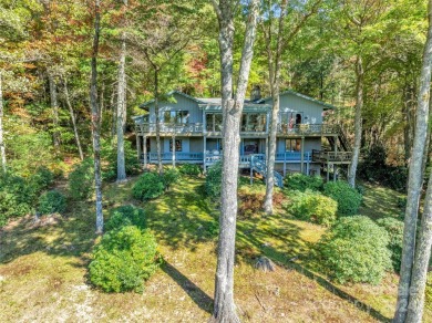 Remarkable golf course and mountain views from this immaculately on Lake Toxaway Country Club in North Carolina - for sale on GolfHomes.com, golf home, golf lot