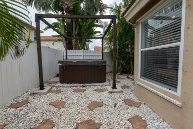 Step into elegance and comfort in this beautifully maintained on Atlantic National Golf and Country Club in Florida - for sale on GolfHomes.com, golf home, golf lot