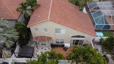 Spacious, well maintained & move-in ready home w/4 bedrooms, 2.5 on Atlantic National Golf and Country Club in Florida - for sale on GolfHomes.com, golf home, golf lot