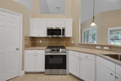 Welcome home to this 4 Bedroom 2 bath Block Stucco Golf Course on Harbor Hills Country Club in Florida - for sale on GolfHomes.com, golf home, golf lot