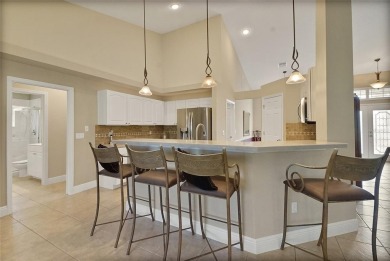 Welcome home to this 4 Bedroom 2 bath Block Stucco Golf Course on Harbor Hills Country Club in Florida - for sale on GolfHomes.com, golf home, golf lot