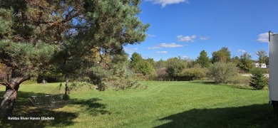 Your Perfect Up North Escape Awaits!  Discover this amazing on Lakeside Golf Course in Michigan - for sale on GolfHomes.com, golf home, golf lot