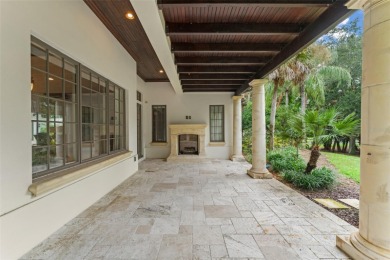 Luxury villa living within the exclusive Gardens of Isleworth on Isleworth Golf and Country Club in Florida - for sale on GolfHomes.com, golf home, golf lot