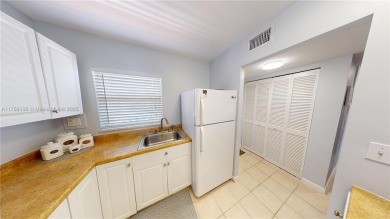 Open the front door to a stunning long lake view!  This is a on Sunrise Lakes Phase III in Florida - for sale on GolfHomes.com, golf home, golf lot