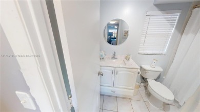Open the front door to a stunning long lake view!  This is a on Sunrise Lakes Phase III in Florida - for sale on GolfHomes.com, golf home, golf lot