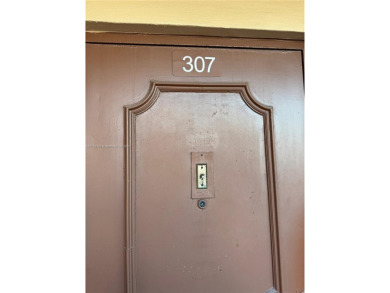 Open the front door to a stunning long lake view!  This is a on Sunrise Lakes Phase III in Florida - for sale on GolfHomes.com, golf home, golf lot