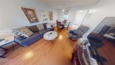 Open the front door to a stunning long lake view!  This is a on Sunrise Lakes Phase III in Florida - for sale on GolfHomes.com, golf home, golf lot