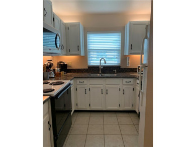 OWNER FINANCING! Active 55+ condo community with 18-27 hole golf on The American Golf Club in Florida - for sale on GolfHomes.com, golf home, golf lot