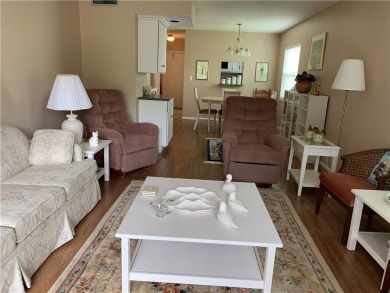 OWNER FINANCING! Active 55+ condo community with 18-27 hole golf on The American Golf Club in Florida - for sale on GolfHomes.com, golf home, golf lot