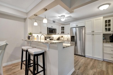 Very Clean freshly painted unit with new modern flooring on Polo Trace Golf Club in Florida - for sale on GolfHomes.com, golf home, golf lot